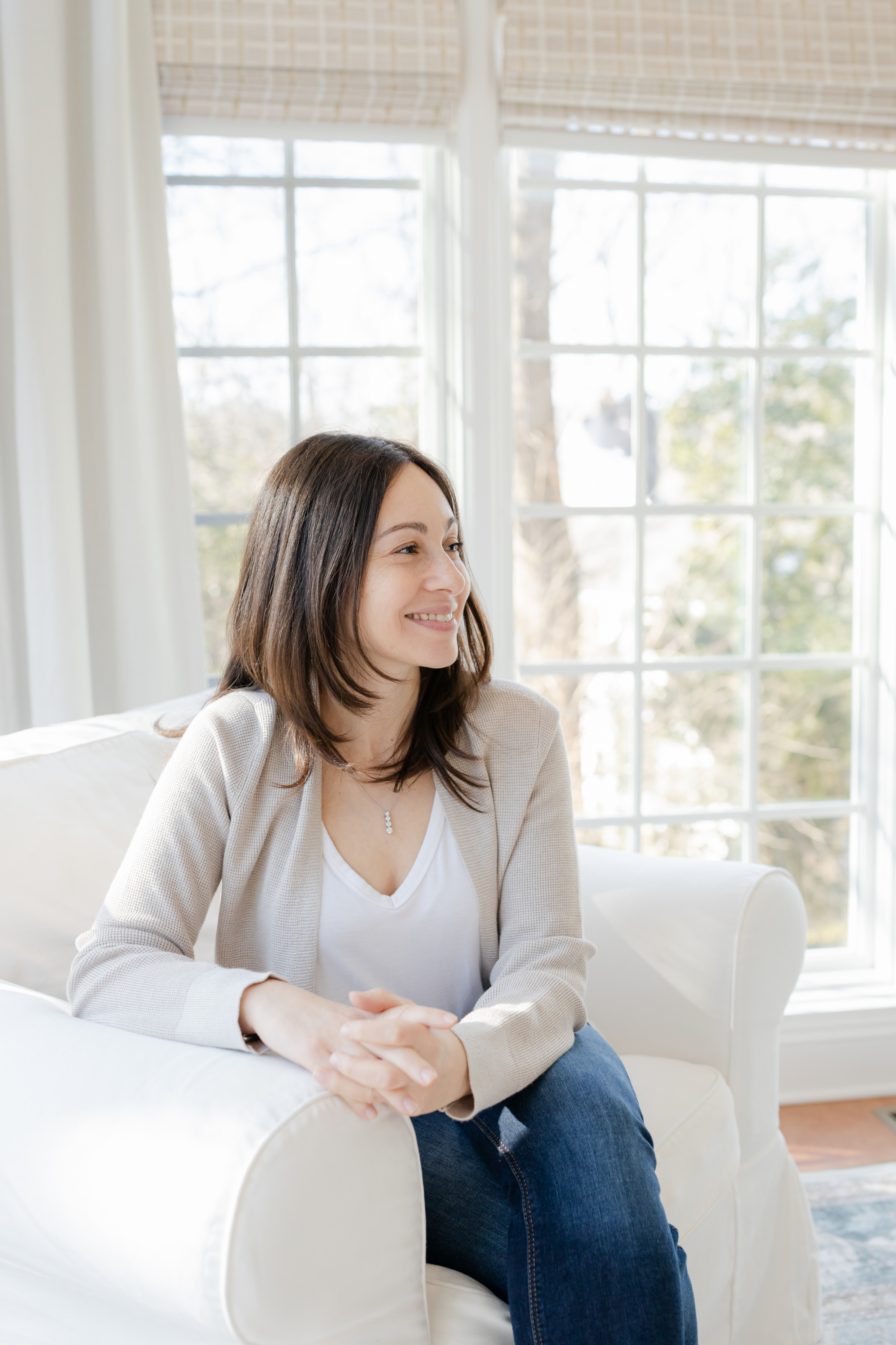 Lisa Williams seated in a bright room
